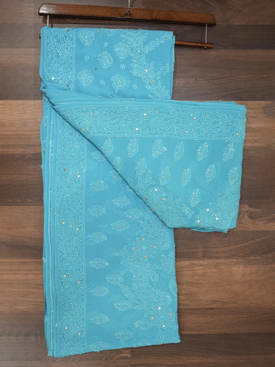 Ada Hand Embroidered Cerulean Blue Pure Georgette Lucknowi Chikankari Saree With Blouse And Mukaish Work 01A246629
