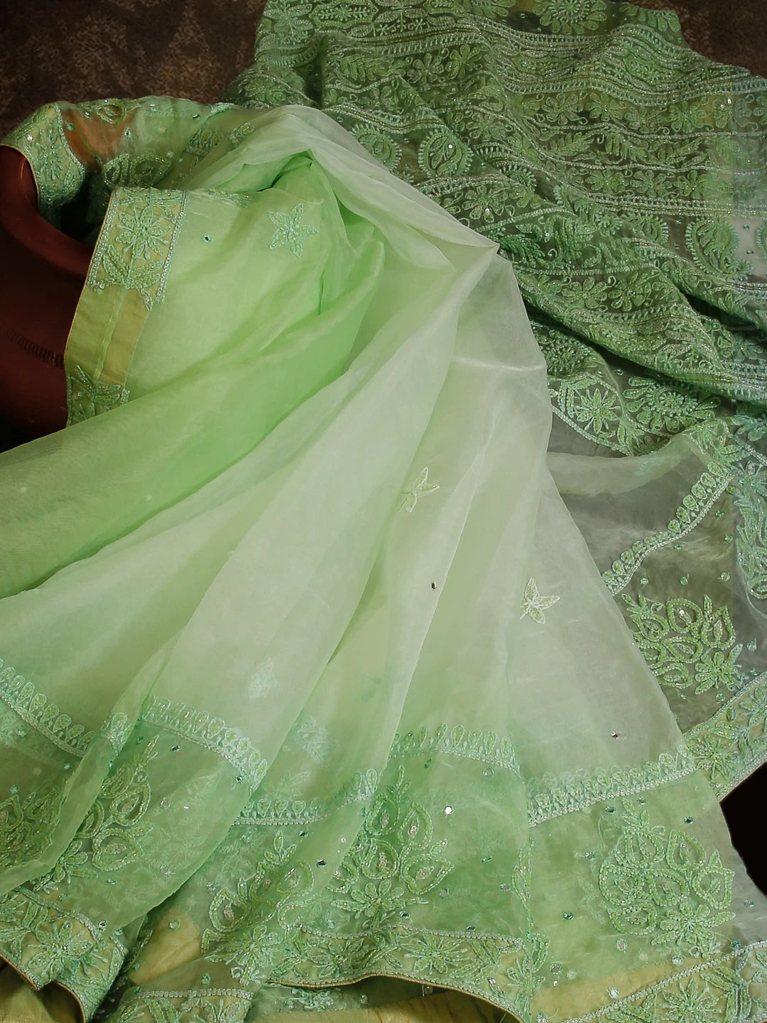 Ada Hand Embroidered Light Green Organza Lucknowi Chikankari Saree With Blouse And Mukaish Work 01A421661