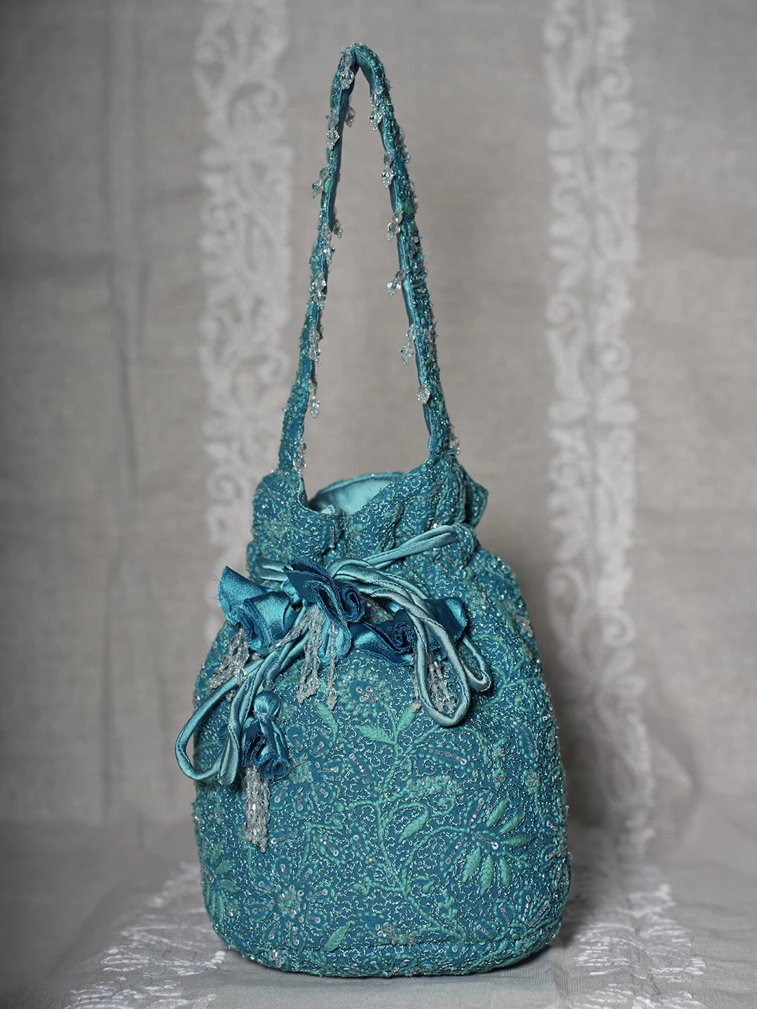 Ada Hand Embroidered Green Pure  Georgette Lucknowi Chikankari Potli Bag With Cutdana Work 01A474590