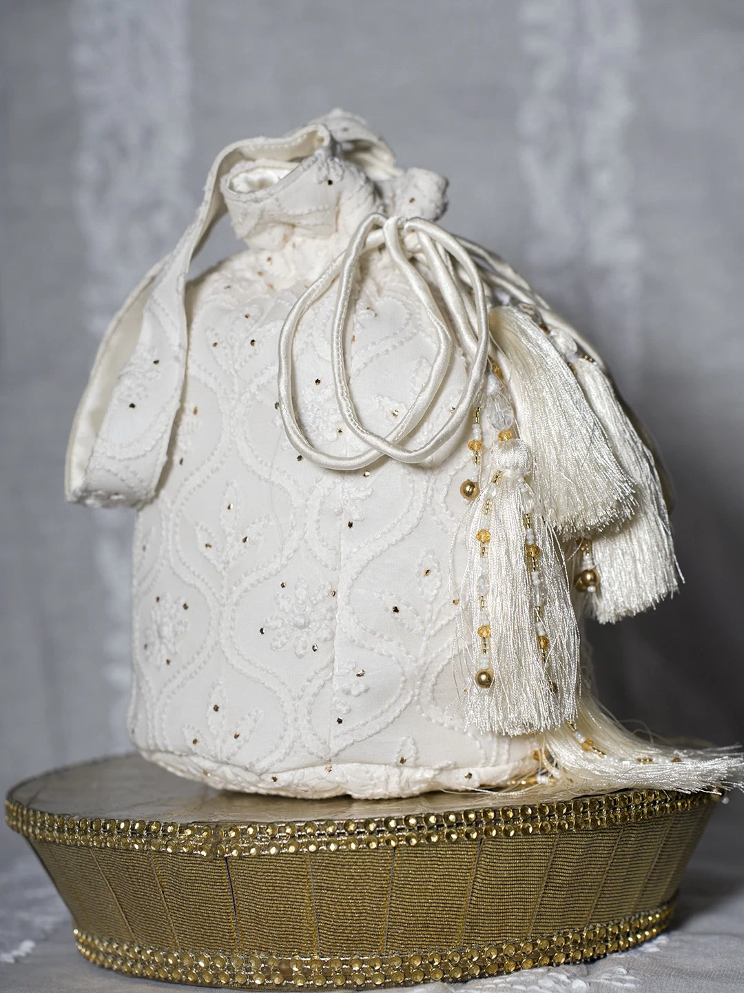 Ada Hand Embroidered Off White Viscsoe Georgette Lucknowi Chikankari Potli Bag With Mukaish Work 01A513055