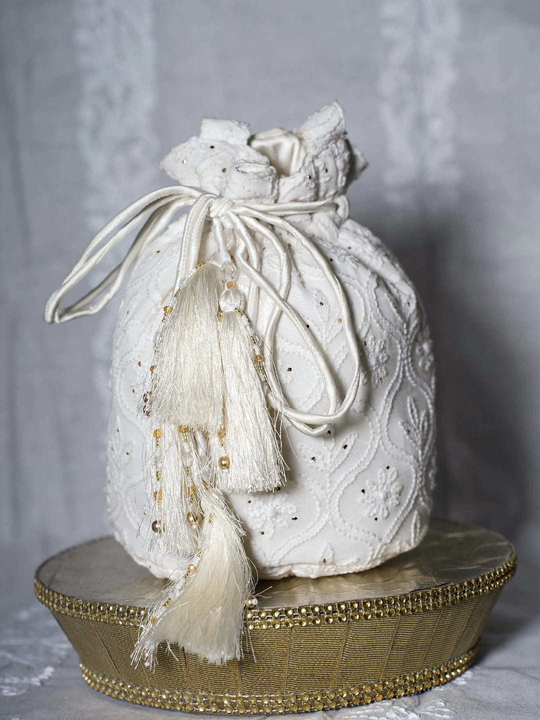 Ada Hand Embroidered Off White Viscsoe Georgette Lucknowi Chikankari Potli Bag With Mukaish Work 01A513055