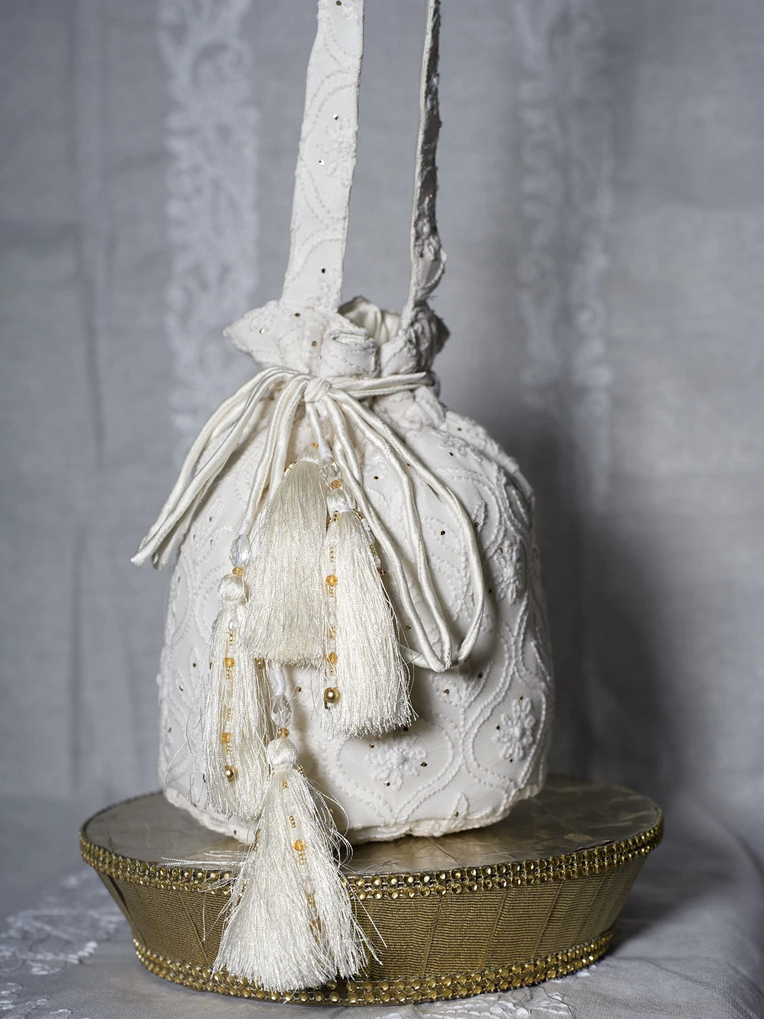 Ada Hand Embroidered Off White Viscsoe Georgette Lucknowi Chikankari Potli Bag With Mukaish Work 01A513055