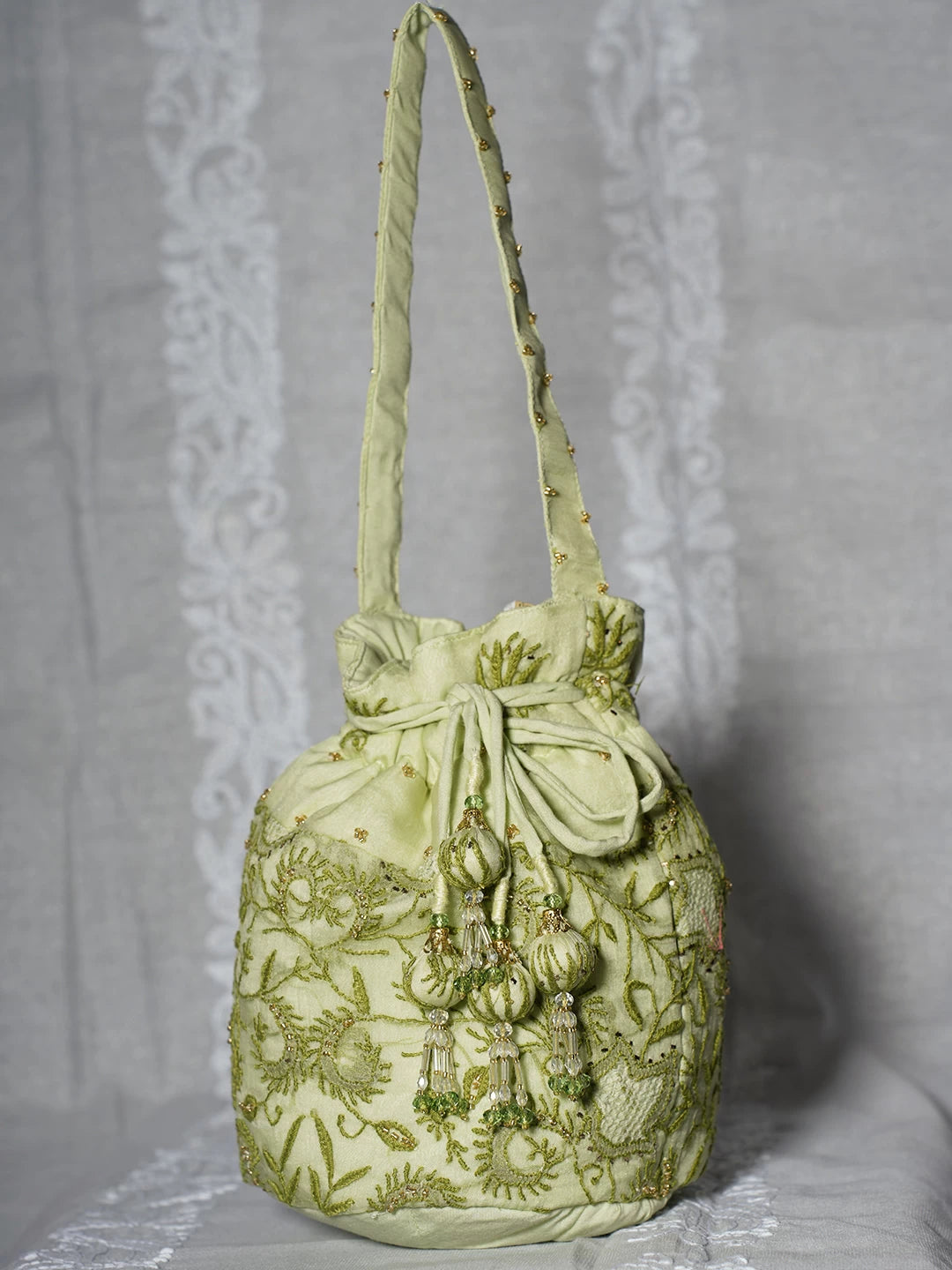 Ada Hand Embroidered Tea Green Organza Lucknowi Chikankari Potli Bag With Cutdana Work 01A498899