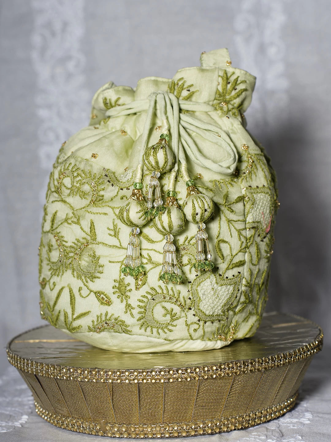 Ada Hand Embroidered Tea Green Organza Lucknowi Chikankari Potli Bag With Cutdana Work 01A498899