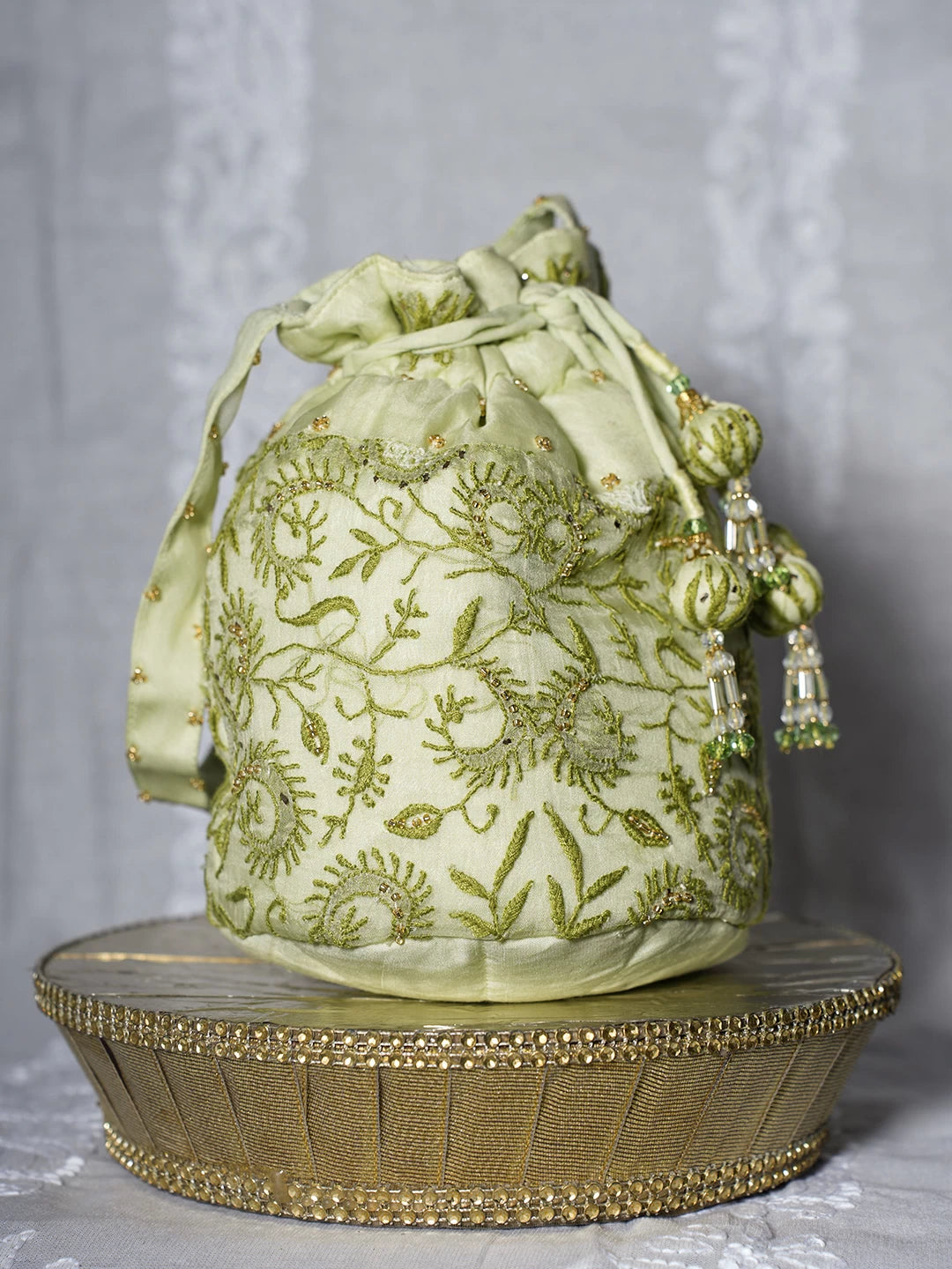 Ada Hand Embroidered Tea Green Organza Lucknowi Chikankari Potli Bag With Cutdana Work 01A498899