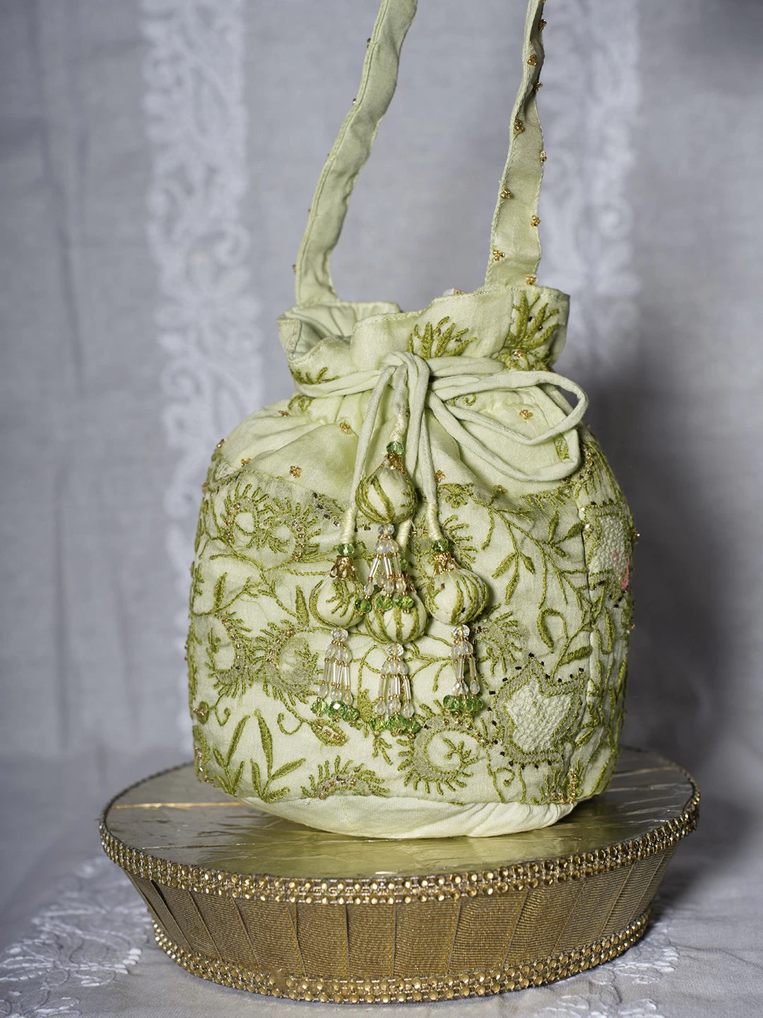 Ada Hand Embroidered Tea Green Organza Lucknowi Chikankari Potli Bag With Cutdana Work 01A498899