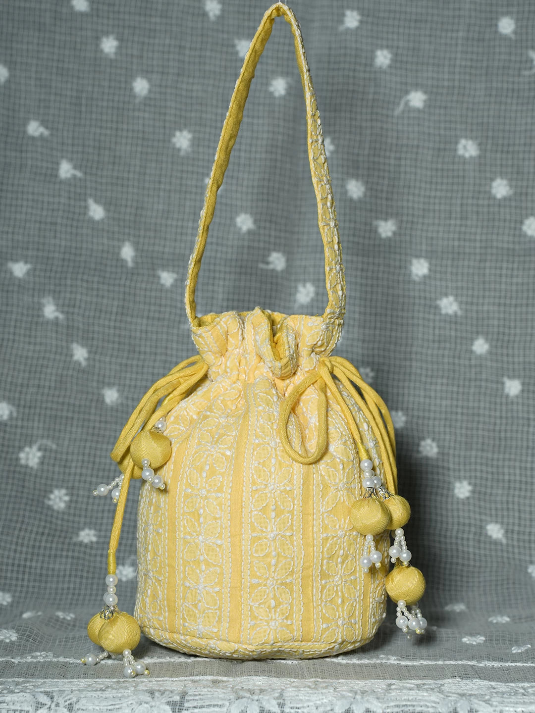 Ada Hand Embroidered Yellow Cotton Lucknowi Chikankari Potli Bag With Pearl Work 01A500910