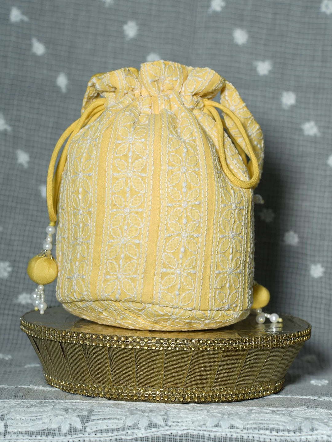 Ada Hand Embroidered Yellow Cotton Lucknowi Chikankari Potli Bag With Pearl Work 01A500910