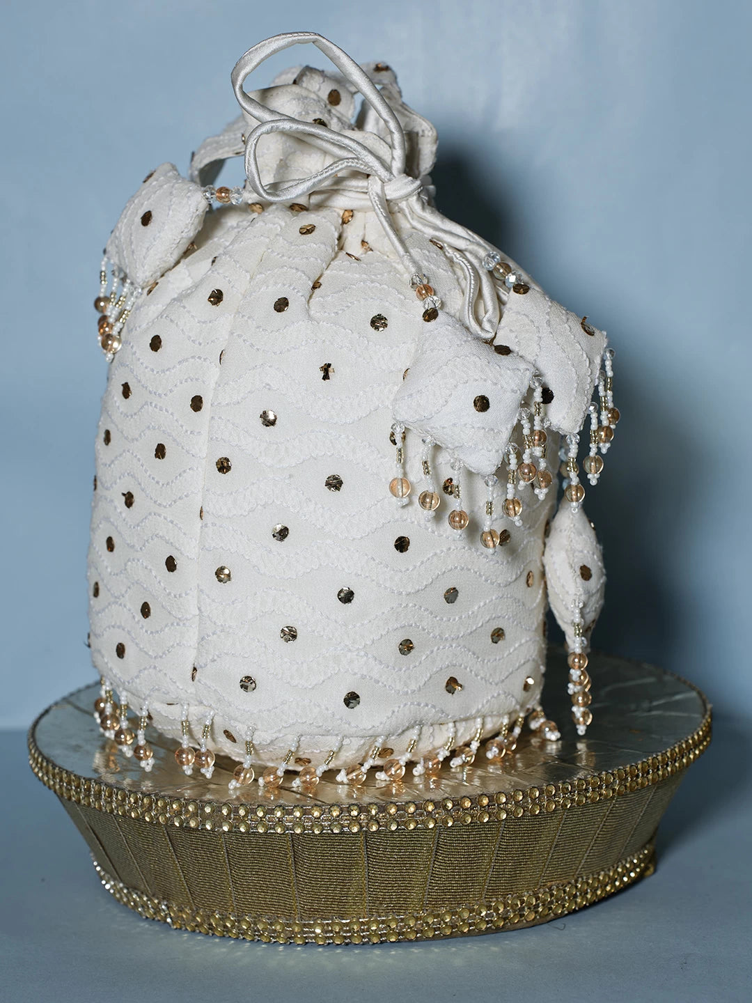 Ada Hand Embroidered Off White Viscsoe Georgette Lucknowi Chikankari Potli Bag With Mukaish Work 01A513053