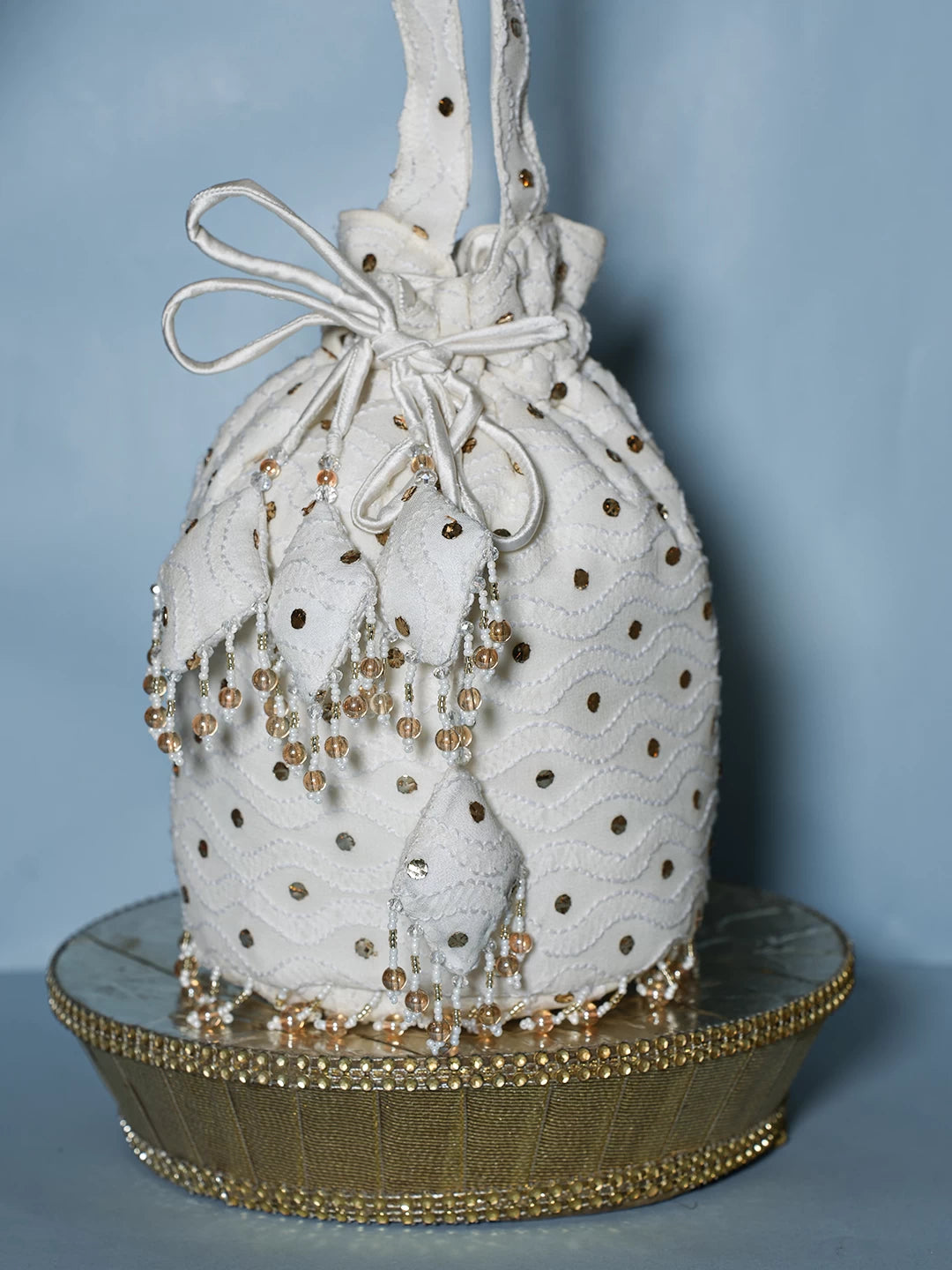 Ada Hand Embroidered Off White Viscsoe Georgette Lucknowi Chikankari Potli Bag With Mukaish Work 01A513053
