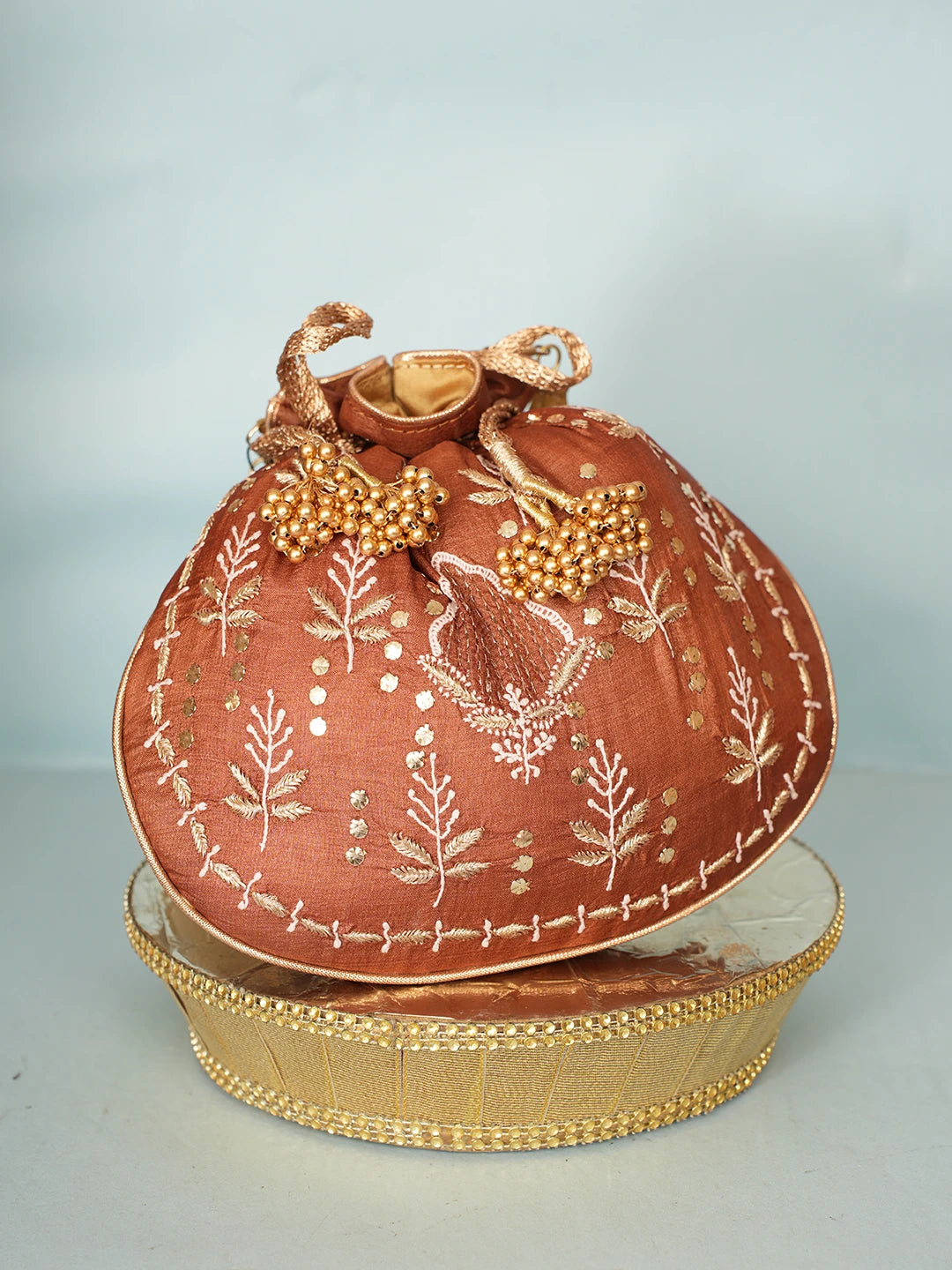 Ada Hand Embroidered Fawn Silk Lucknowi Chikankari Potli Bag With Zari Work 01A578131