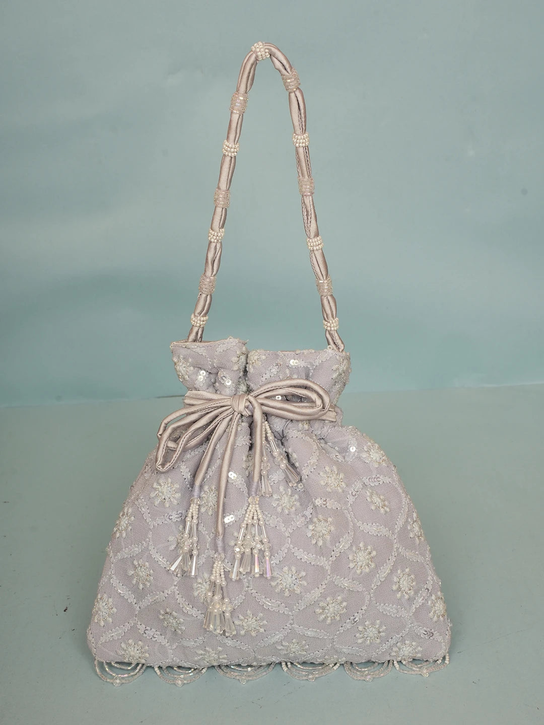 Ada Hand Embroidered Lavender Viscose Georgette Lucknowi Chikankari Potli Bag With Sequinned Work 01A560447