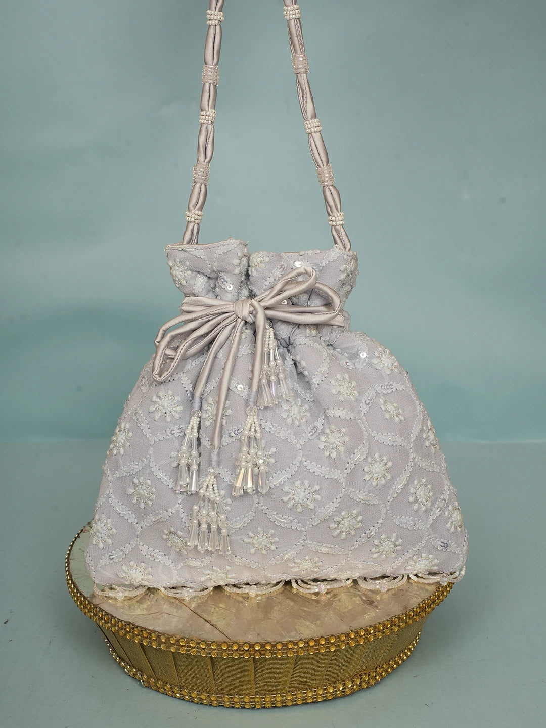 Ada Hand Embroidered Lavender Viscose Georgette Lucknowi Chikankari Potli Bag With Sequinned Work 01A560447