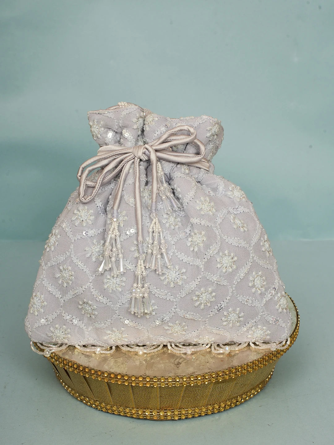 Ada Hand Embroidered Lavender Viscose Georgette Lucknowi Chikankari Potli Bag With Sequinned Work 01A560447