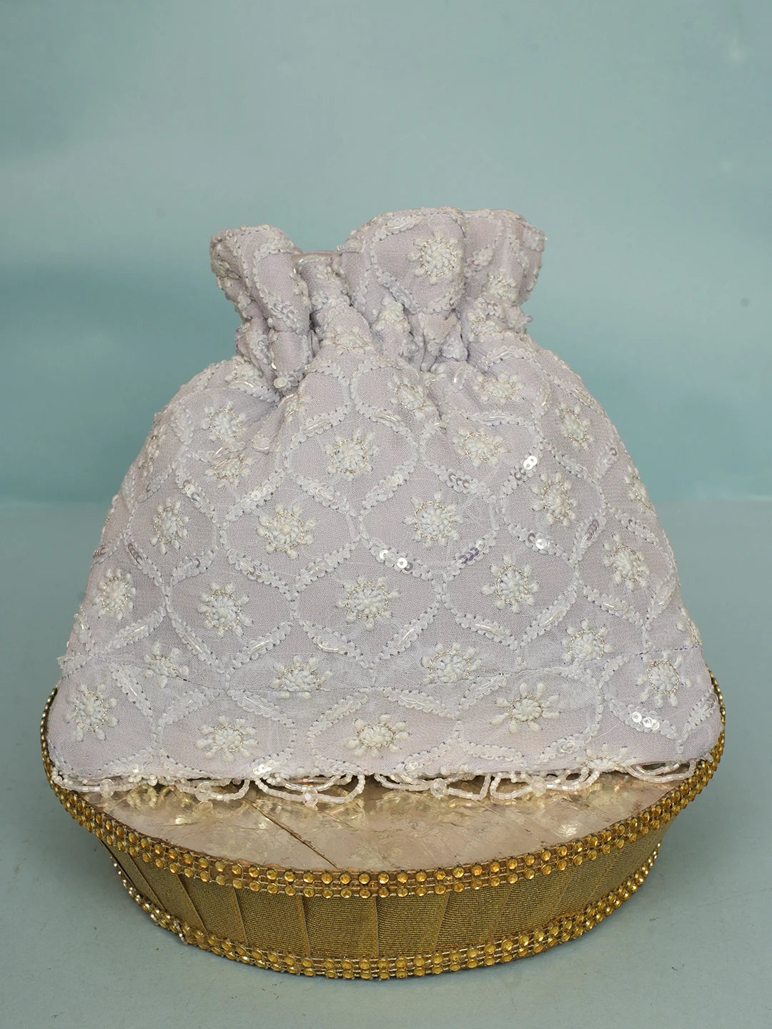 Ada Hand Embroidered Lavender Viscose Georgette Lucknowi Chikankari Potli Bag With Sequinned Work 01A560447