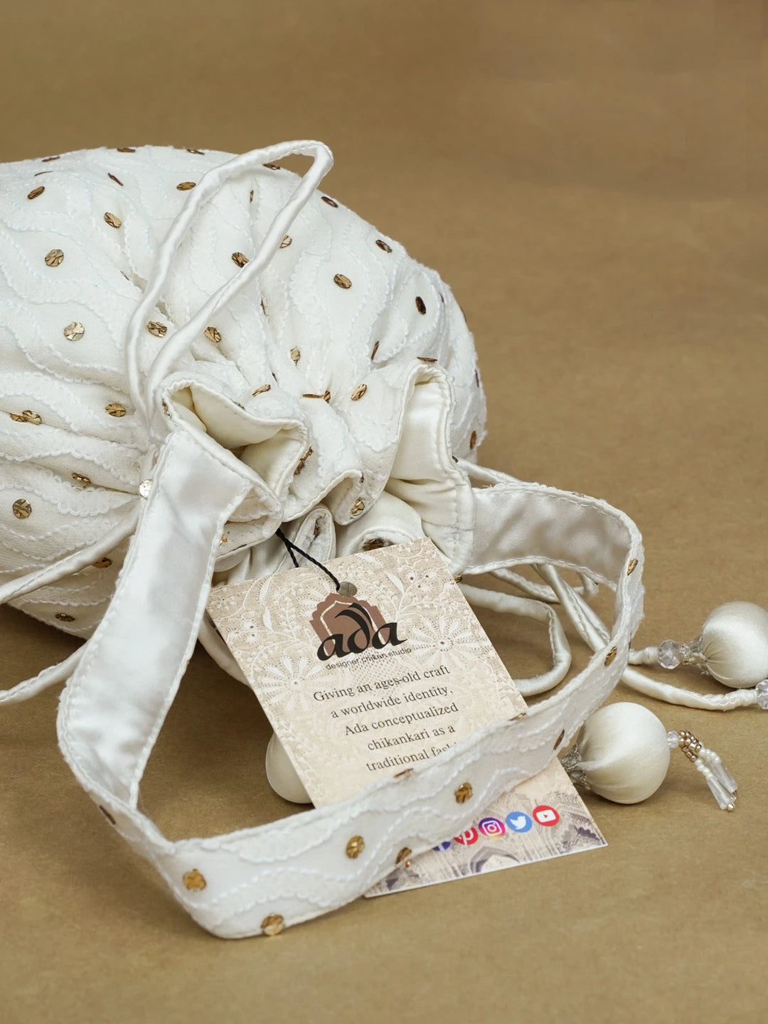 Ada Hand Embroidered White Pure Georgette Lucknowi Chikankari Potli Bag With Muqaish Work 01A584828