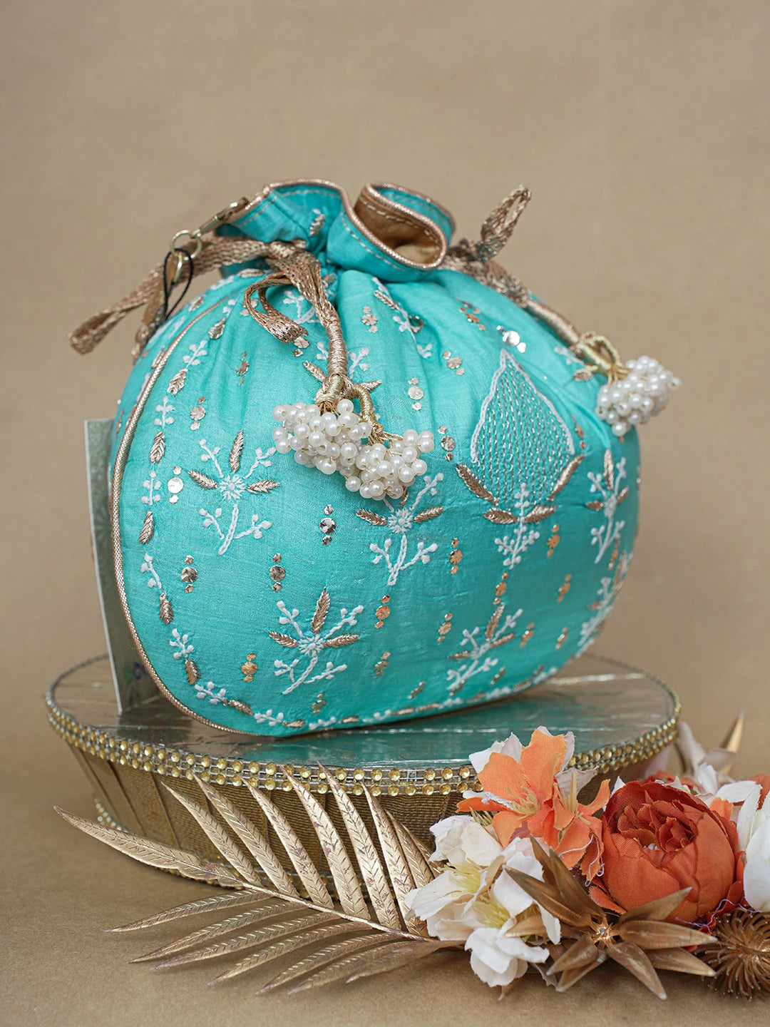 Ada Hand Embroidered Blue Silk Lucknowi Chikankari Potli Bag With Zari and Muqaish/Mukaish Work 01A626560