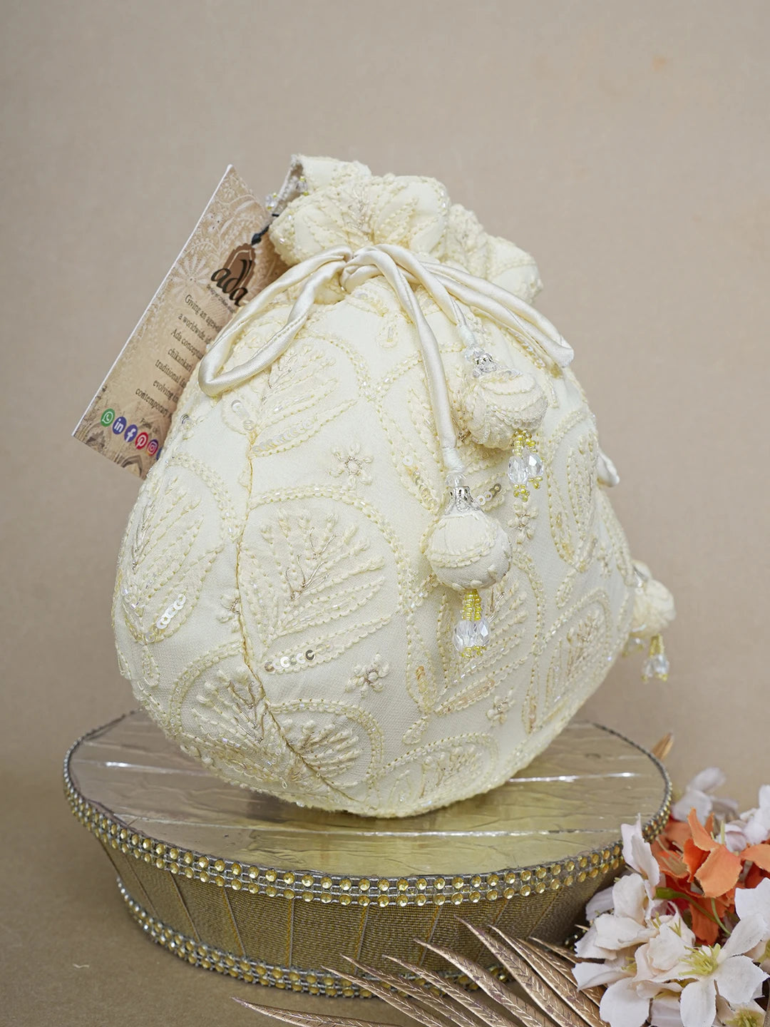 Ada Hand Embroidered Flax Yellow Viscose Georgette Lucknowi Chikankari Potli Bag With Sequinned Work 01A643140