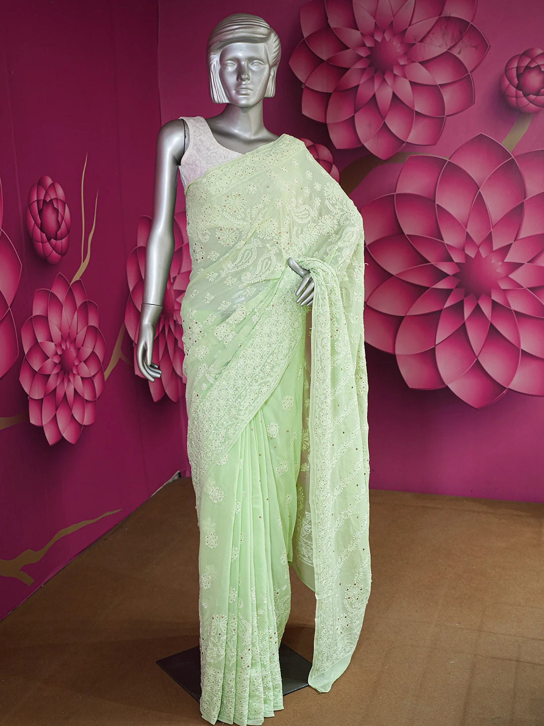 Ada Hand Embroidered Lime Green Pure Georgette Lucknowi Chikankari Saree and Blouse With Muqaish Work 01A404683