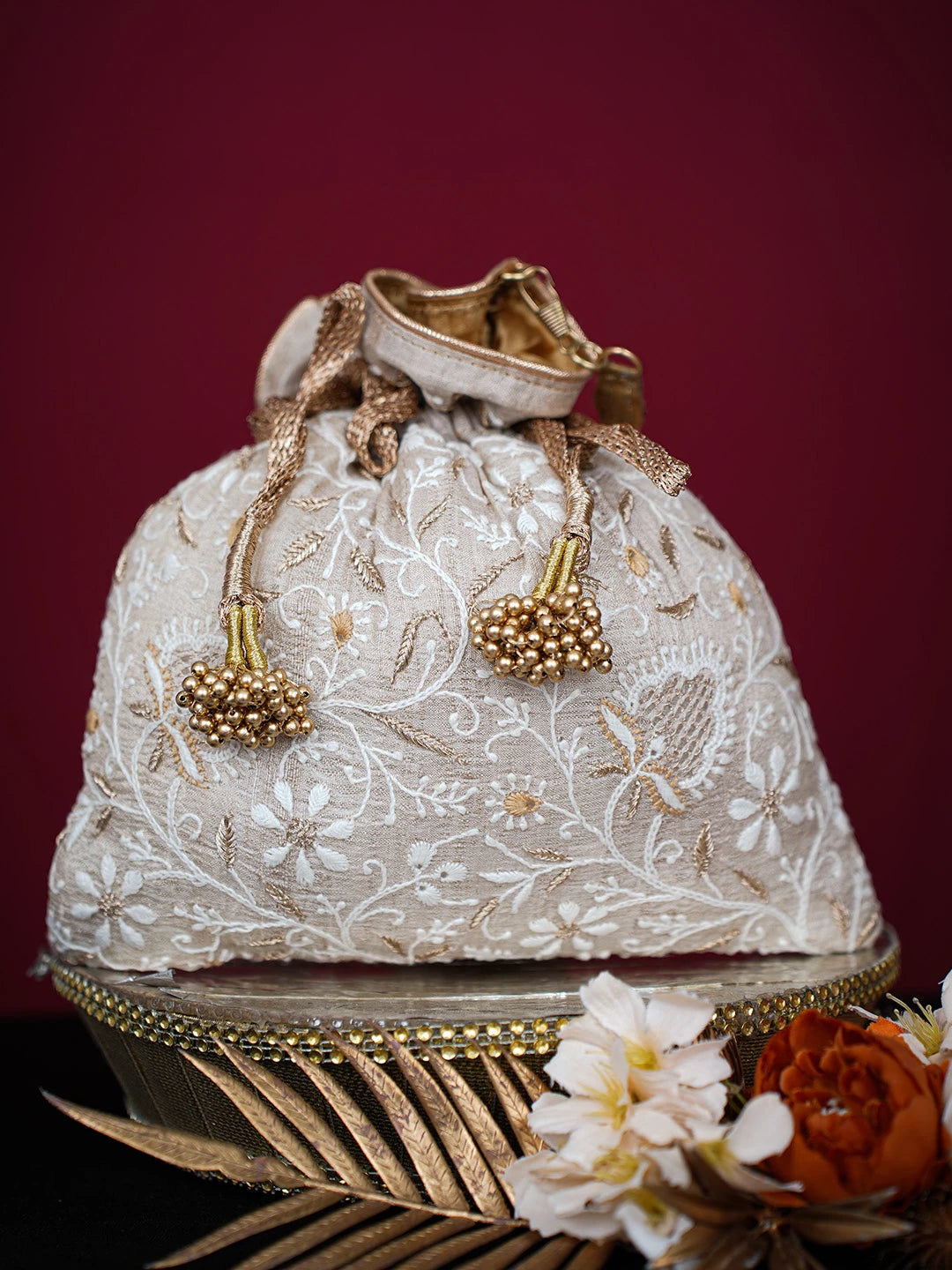 Ada Hand Embroidered Fawn Silk Lucknowi Chikankari Potli Bag With Zari Work 01A718849