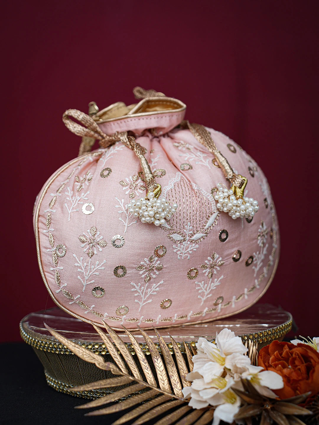 Ada Hand Embroidered Peach Silk Lucknowi Chikankari Potli Bag With Mukaish Work 01A725582