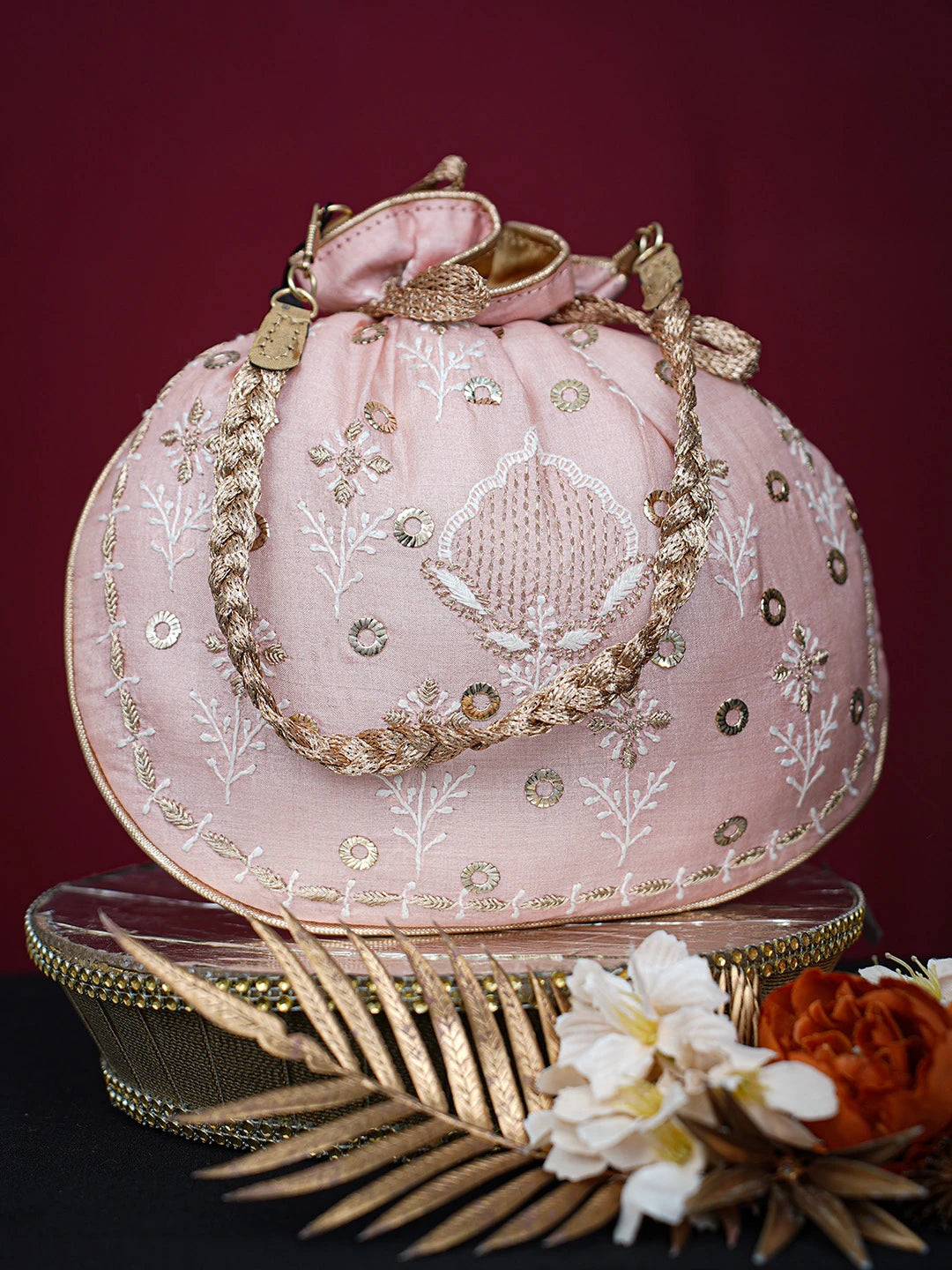 Ada Hand Embroidered Peach Silk Lucknowi Chikankari Potli Bag With Mukaish Work 01A725582