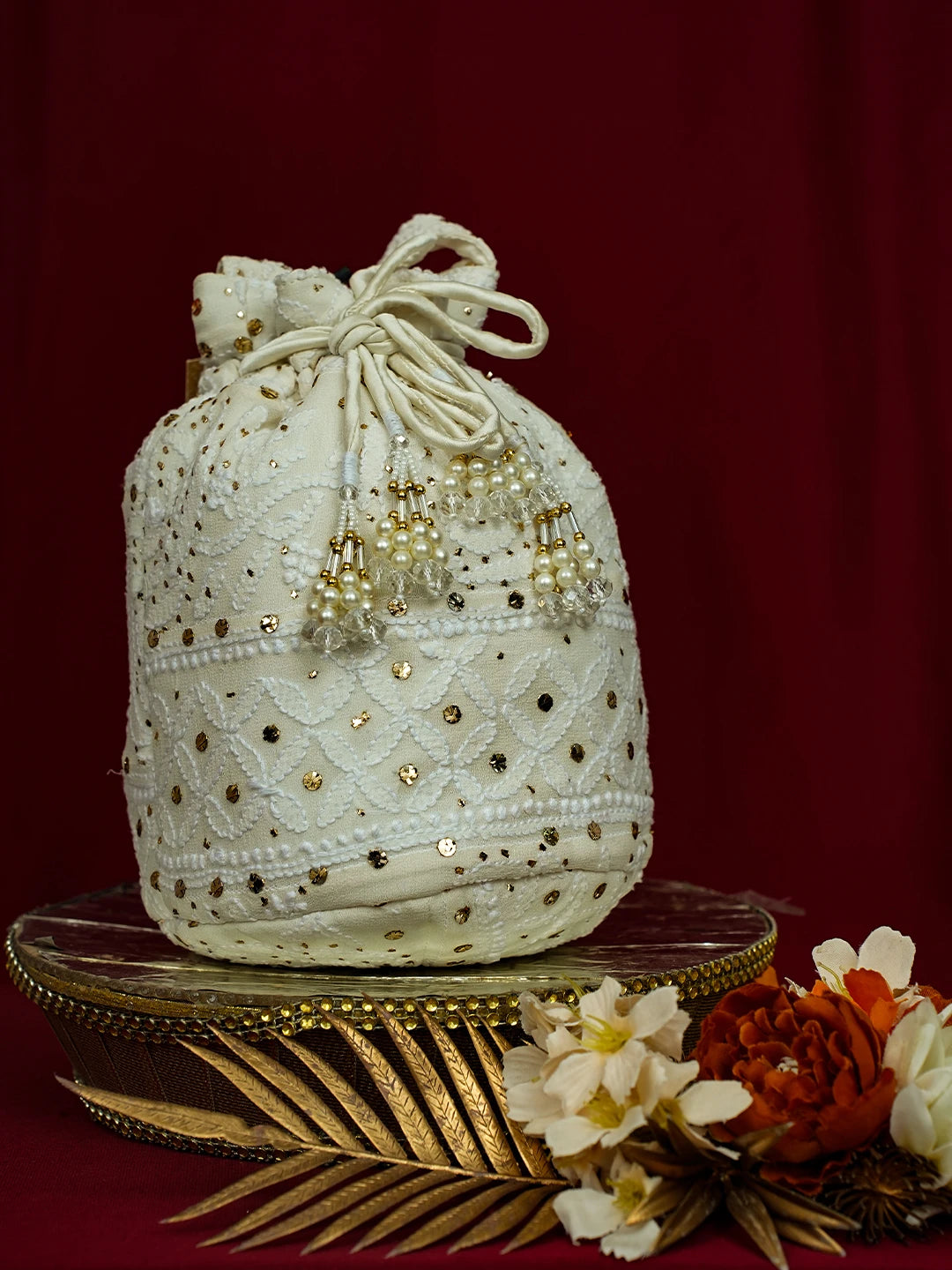 Ada Hand Embroidered White Viscose Georgette Lucknowi Chikankari Potli Bag With Mukaish Work 01A728859