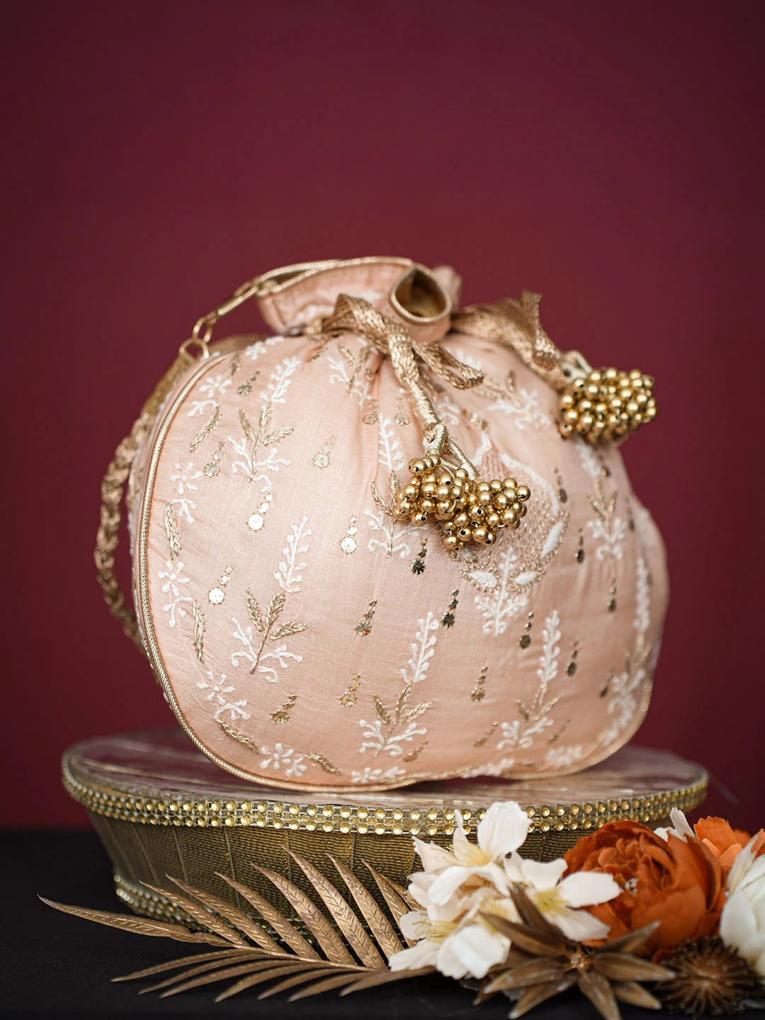 Ada Hand Embroidered Peach Silk Lucknowi Chikankari Potli Bag With Muqaish Work 01A680719