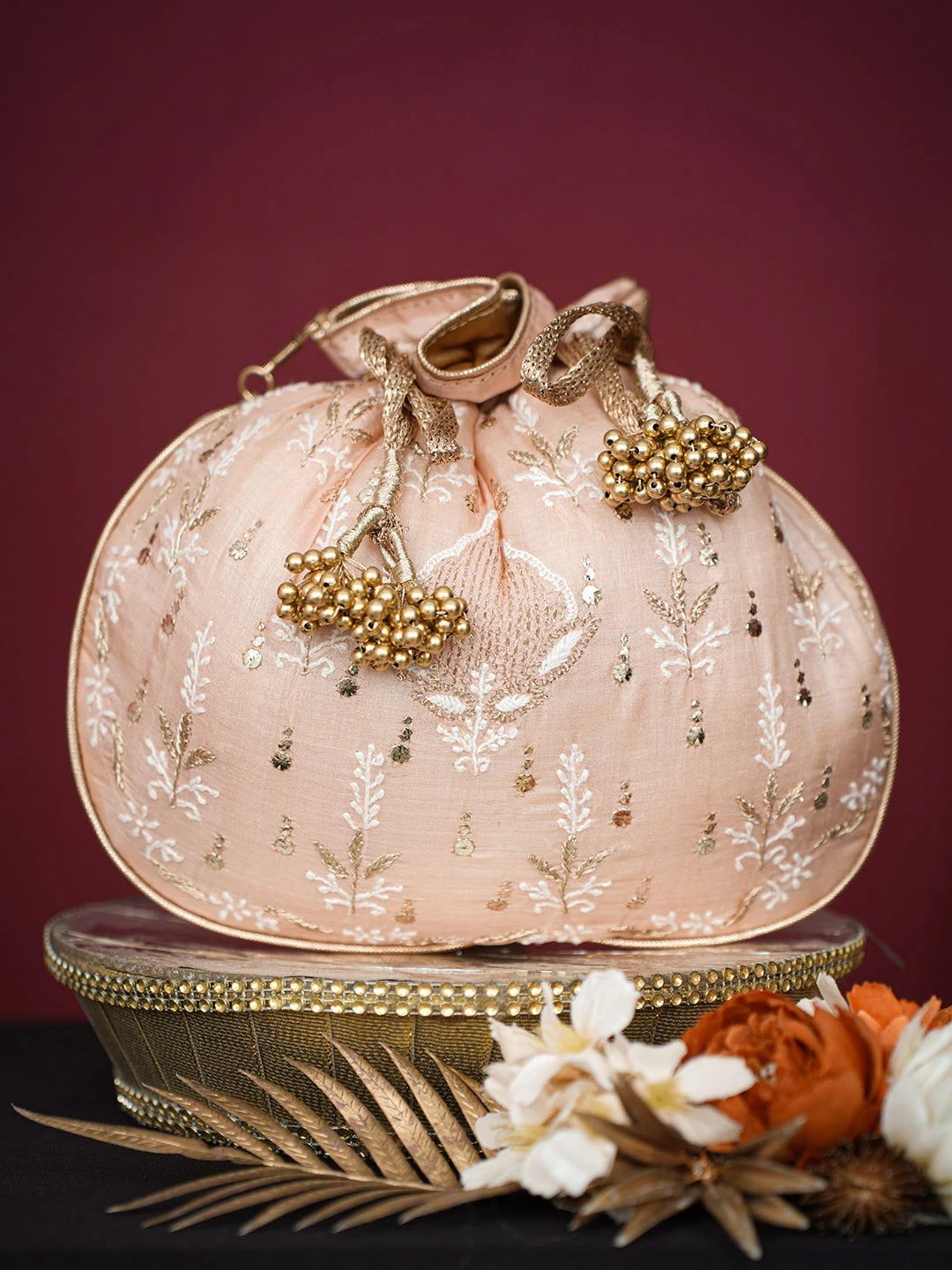 Ada Hand Embroidered Peach Silk Lucknowi Chikankari Potli Bag With Muqaish Work 01A680719