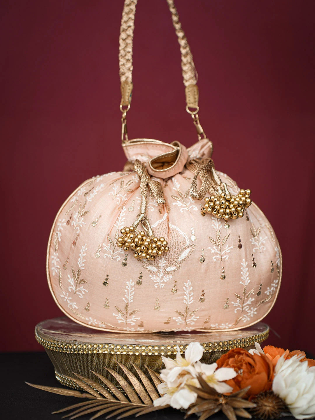 Ada Hand Embroidered Peach Silk Lucknowi Chikankari Potli Bag With Muqaish Work 01A680719