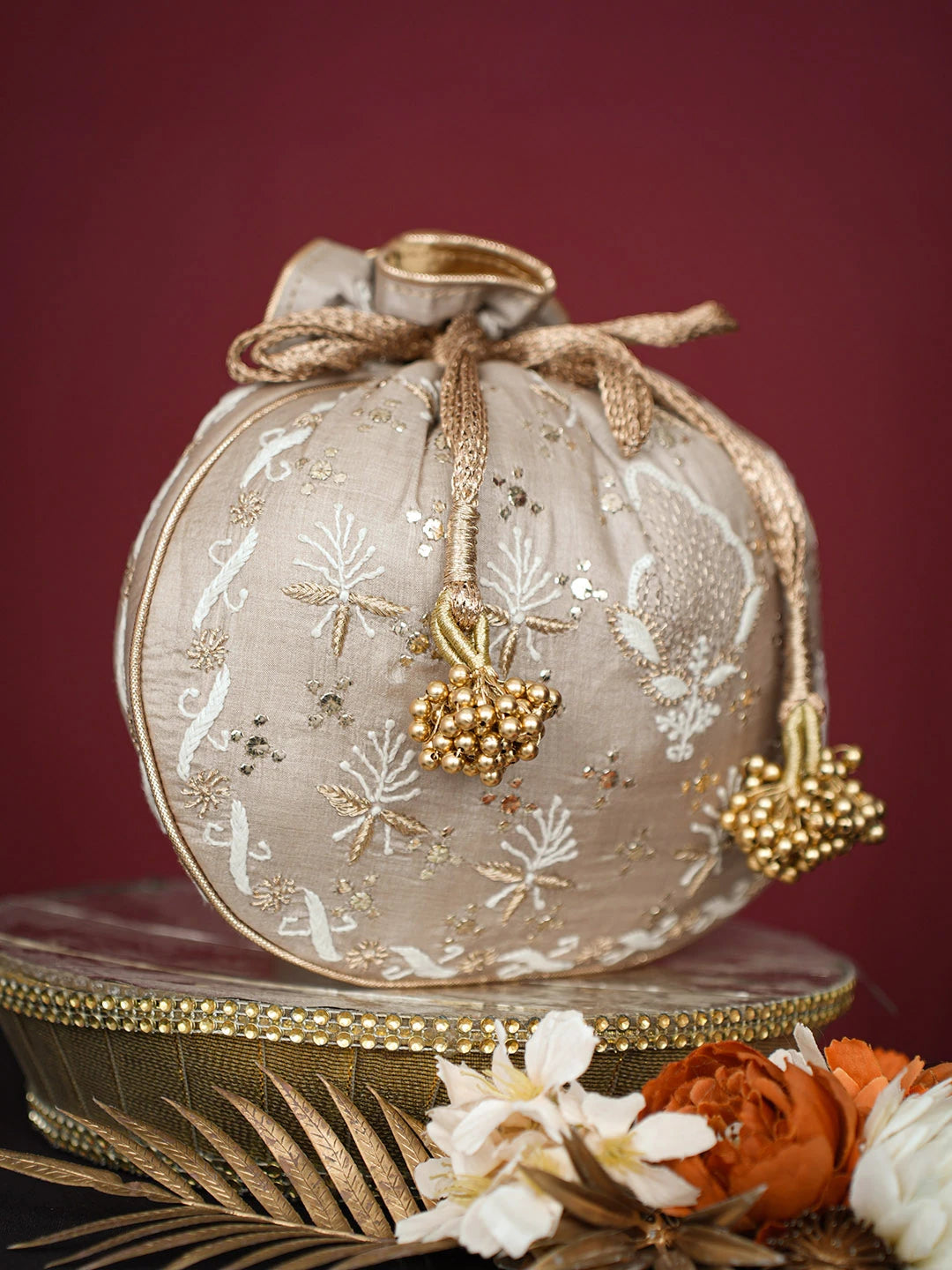 Ada Hand Embroidered Fawn Silk Lucknowi Chikankari Potli Bag With Muqaish Work 01A738575