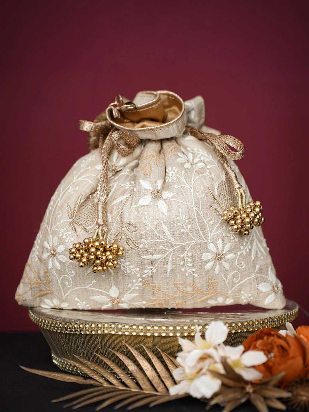 Ada Hand Embroidered Fawn Silk Lucknowi Chikankari Potli Bag With Zari Work 01A718860