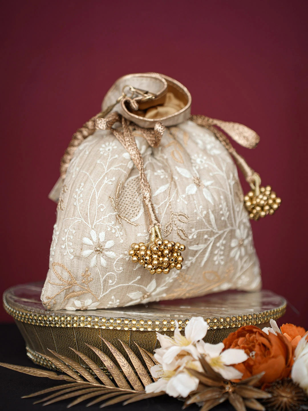 Ada Hand Embroidered Fawn Silk Lucknowi Chikankari Potli Bag With Zari Work 01A718860