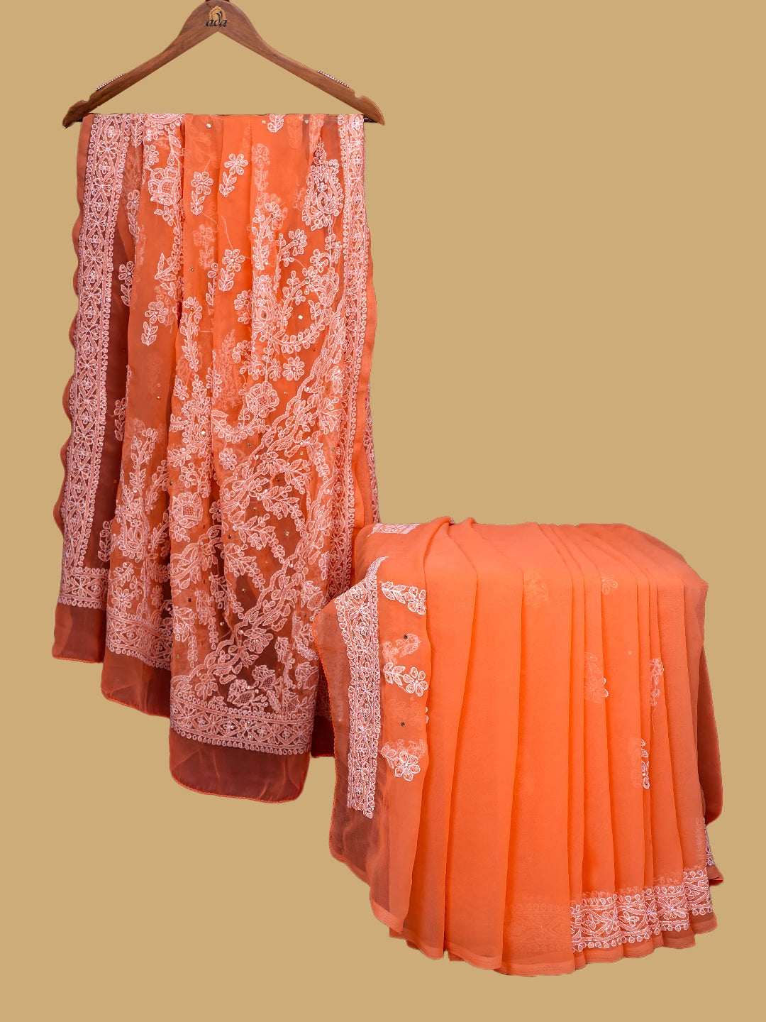 Ada Hand Embroidered Orange Georgette Lucknowi Chikankari Saree and Blouse With Muqaish Work 01A559023