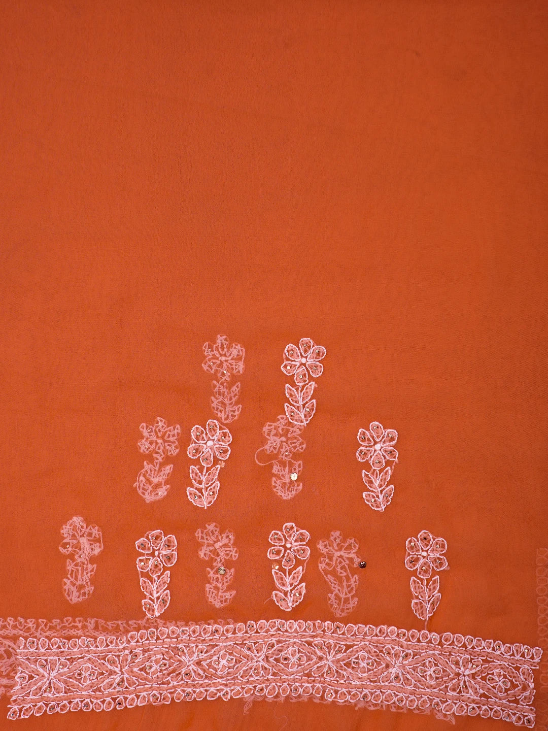Ada Hand Embroidered Orange Georgette Lucknowi Chikankari Saree and Blouse With Muqaish Work 01A559023