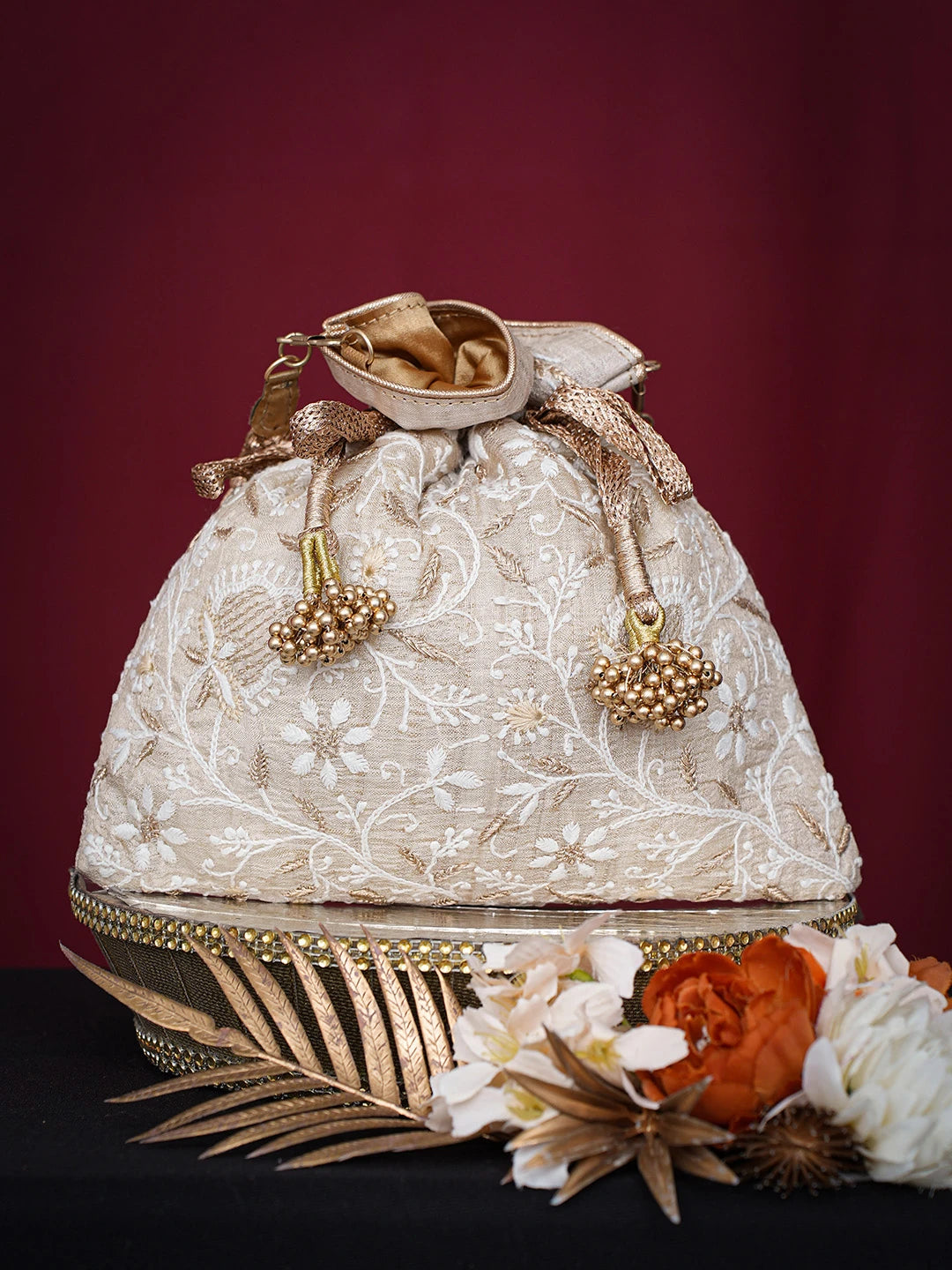 Ada Hand Embroidered Fawn Silk Lucknowi Chikankari Potli Bag With Golden Zari Taar Work 01A718852