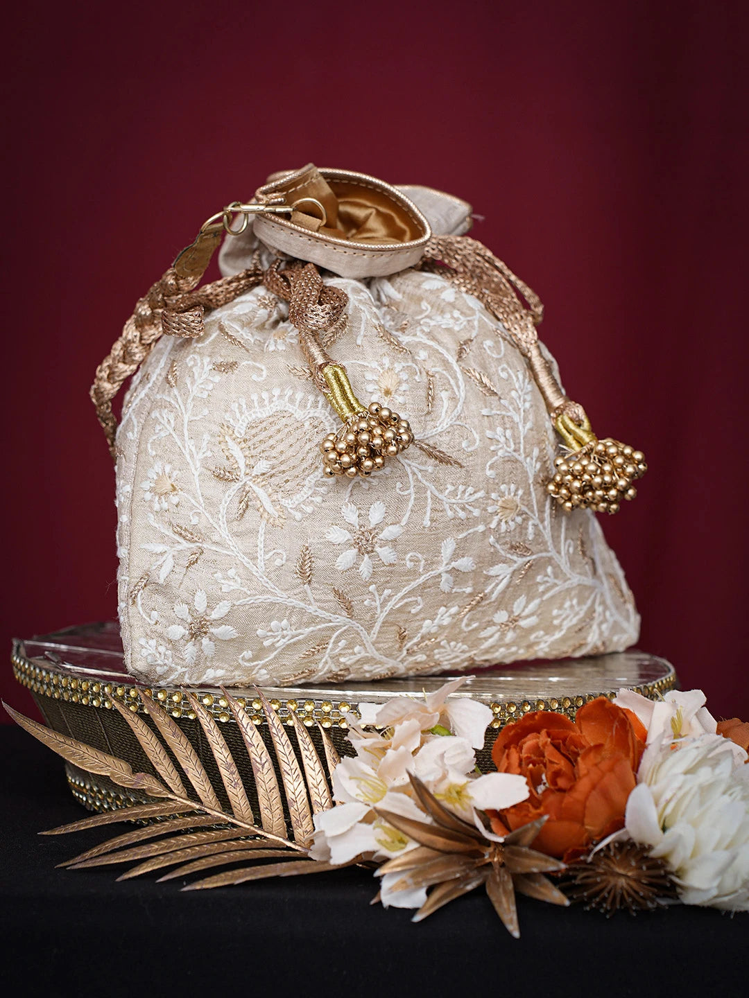 Ada Hand Embroidered Fawn Silk Lucknowi Chikankari Potli Bag With Golden Zari Taar Work 01A718852