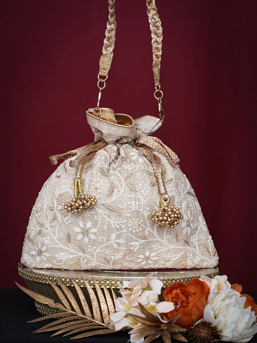 Ada Hand Embroidered Fawn Silk Lucknowi Chikankari Potli Bag With Golden Zari Taar Work 01A718852