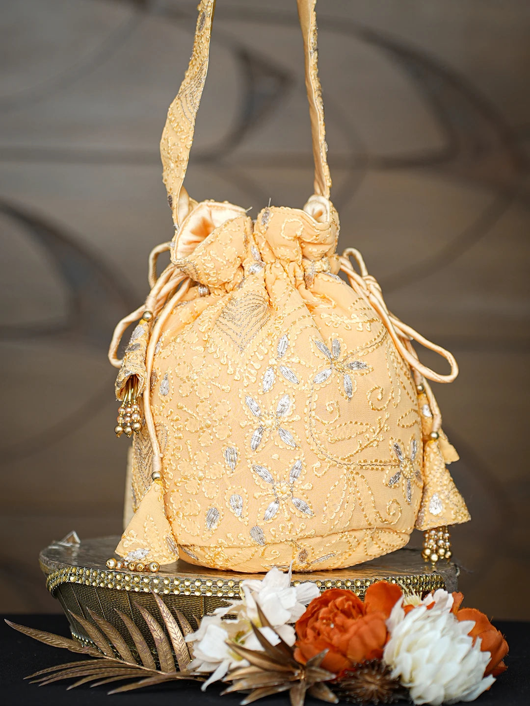 Ada Hand Embroidered Mustard Viscose Georgette Lucknowi Chikankari Potli Bag With Gota Patti Work 01A631271