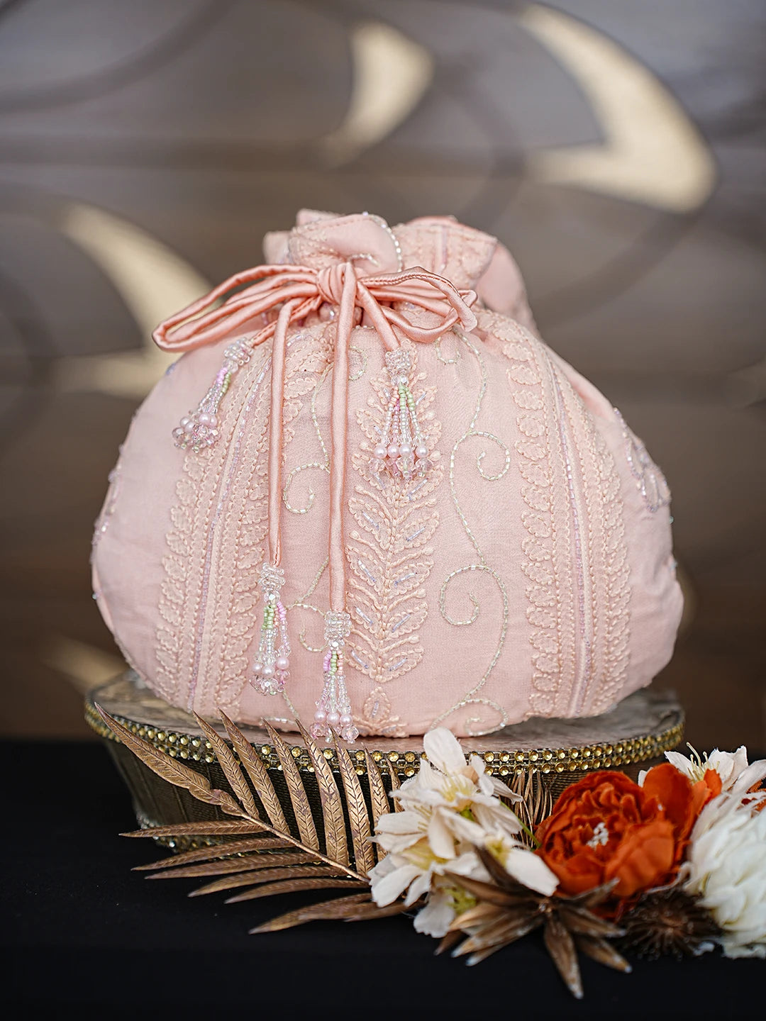 Ada Hand Embroidered Light Peach Faux Georgette Lucknowi Chikankari Potli Bag With Cutdana Work 01A862595