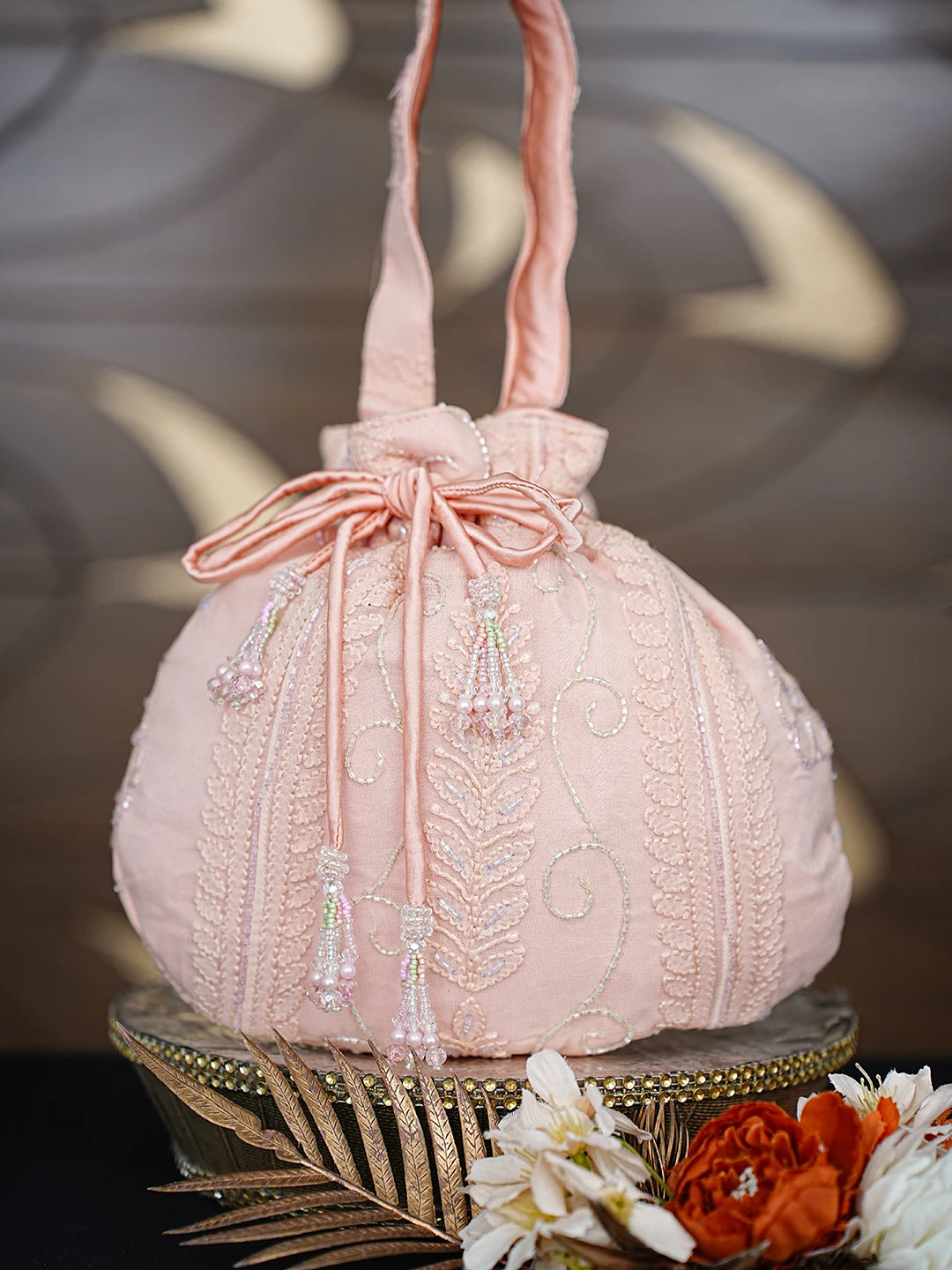Ada Hand Embroidered Light Peach Faux Georgette Lucknowi Chikankari Potli Bag With Cutdana Work 01A862595