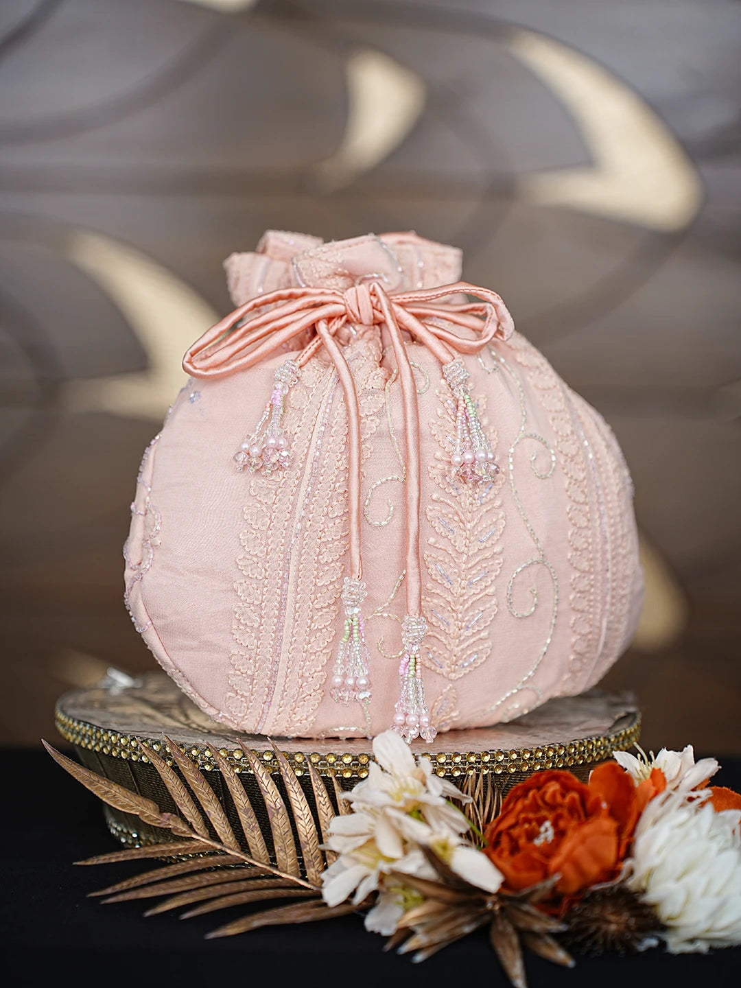 Ada Hand Embroidered Light Peach Faux Georgette Lucknowi Chikankari Potli Bag With Cutdana Work 01A862595