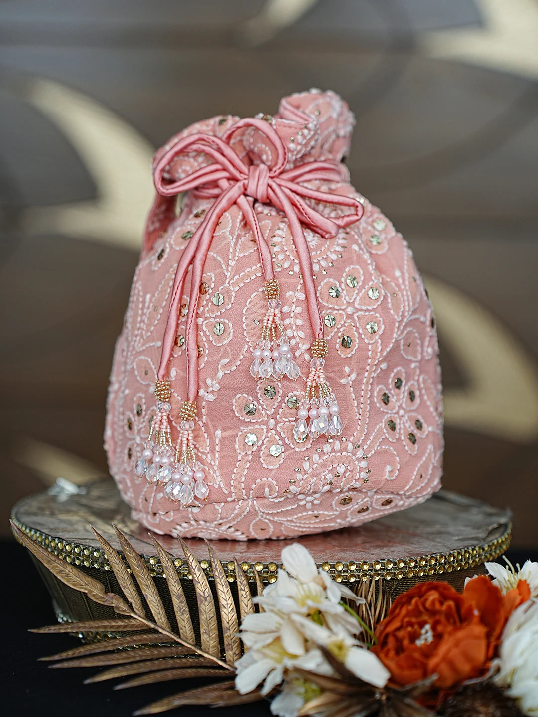 Ada Hand Embroidered Peach Georgette Lucknowi Chikankari Potli Bag With Muqaish Work 01A862590