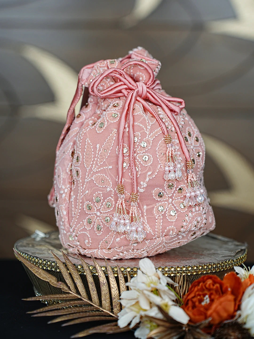 Ada Hand Embroidered Peach Georgette Lucknowi Chikankari Potli Bag With Muqaish Work 01A862590
