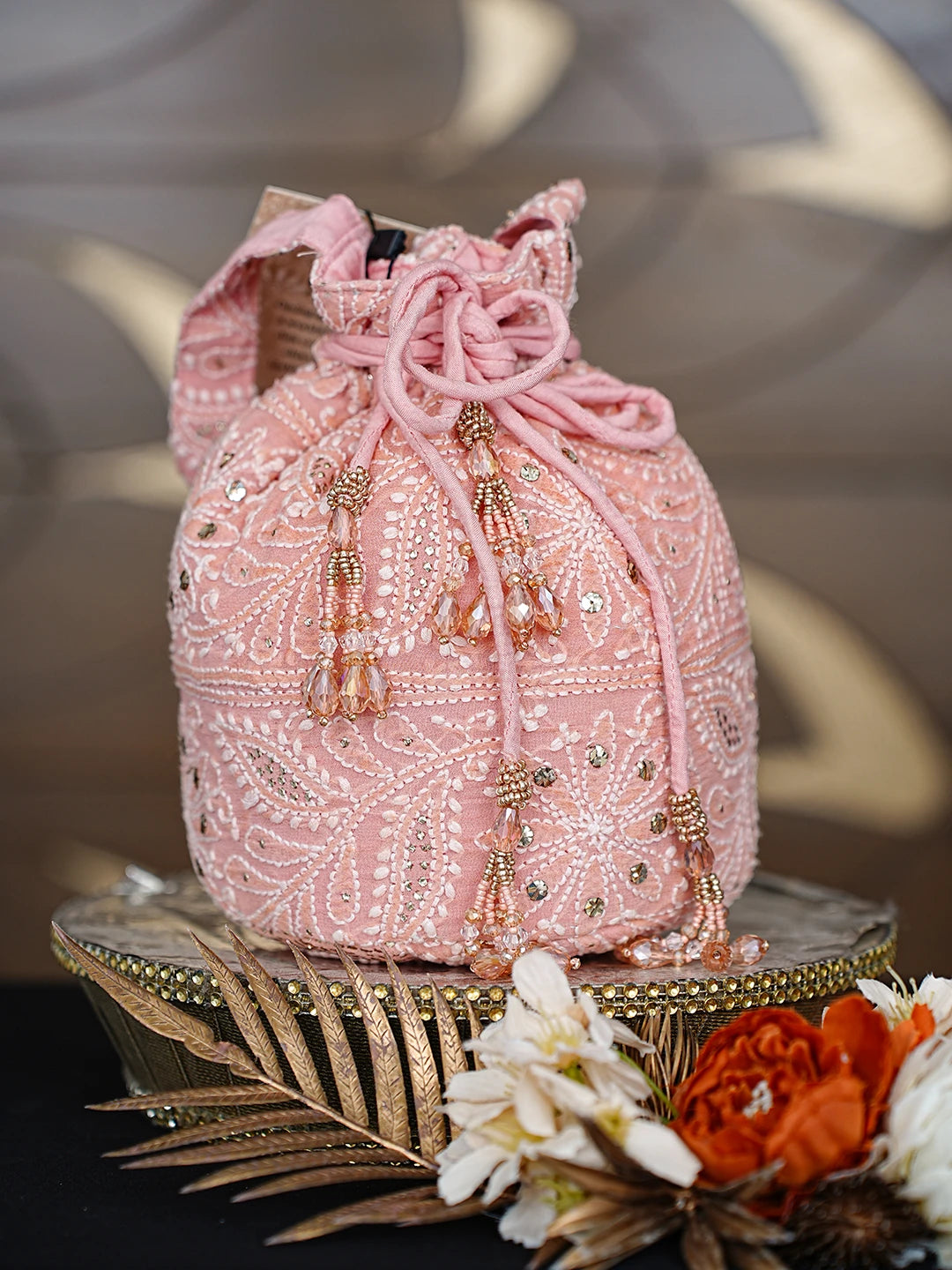 Ada Hand Embroidered Carrot Pink Viscose Georgette Lucknowi Chikankari Potli Bag With Muqaish Work 01A872375