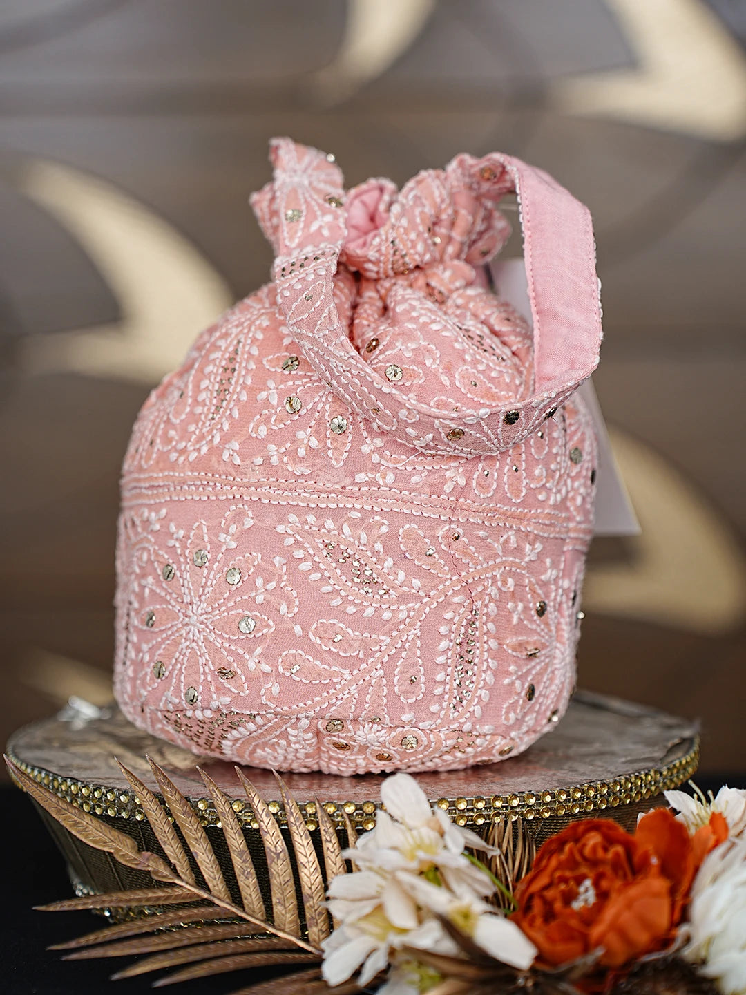 Ada Hand Embroidered Carrot Pink Viscose Georgette Lucknowi Chikankari Potli Bag With Muqaish Work 01A872375