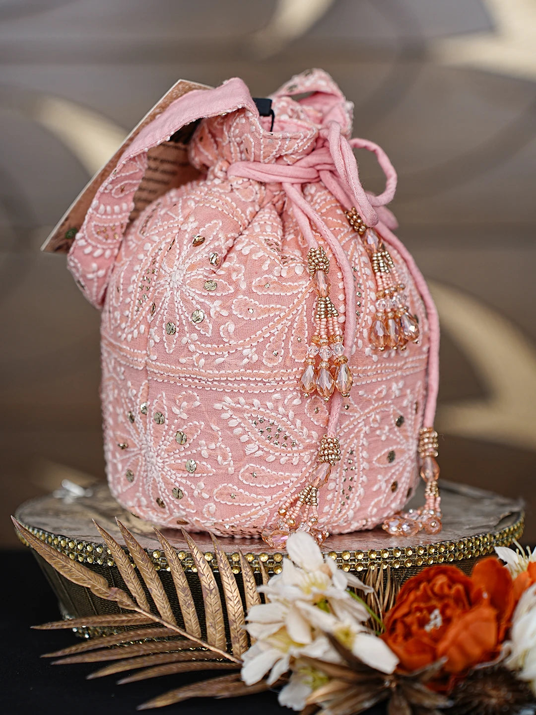 Ada Hand Embroidered Carrot Pink Viscose Georgette Lucknowi Chikankari Potli Bag With Muqaish Work 01A872375