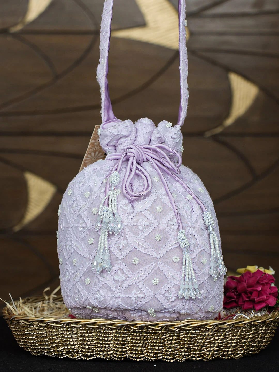 Ada Hand Embroidered Lavender Viscose Georgette Lucknowi Chikankari Potli Bag With Cutdana Work 01A955262