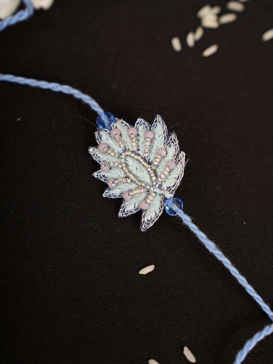 Ada Hand Embroidered Blue Cotton Raksha Sutra Rakhi With Cutdana Work 08A502966