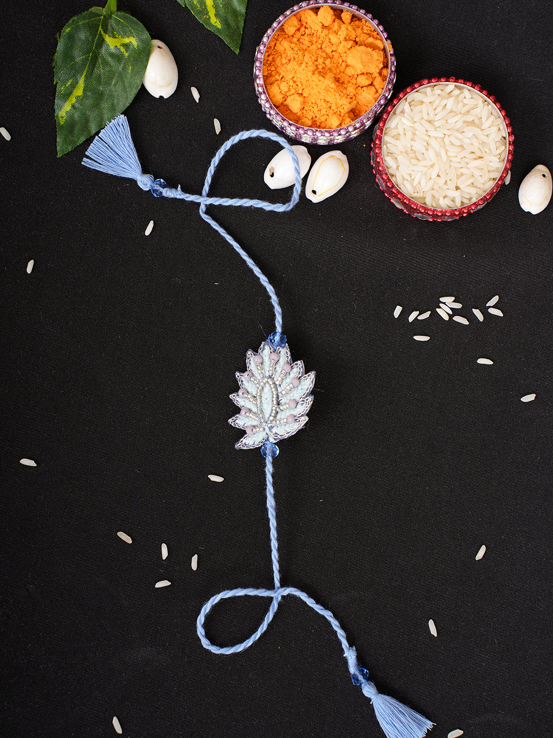 Ada Hand Embroidered Blue Cotton Raksha Sutra Rakhi With Cutdana Work 08A502966